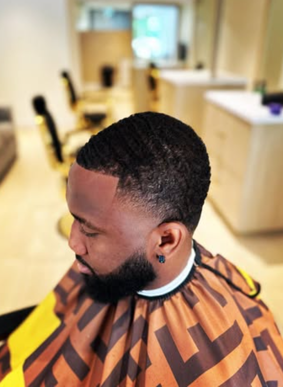Barber giving a fade haircut in Coquitlam