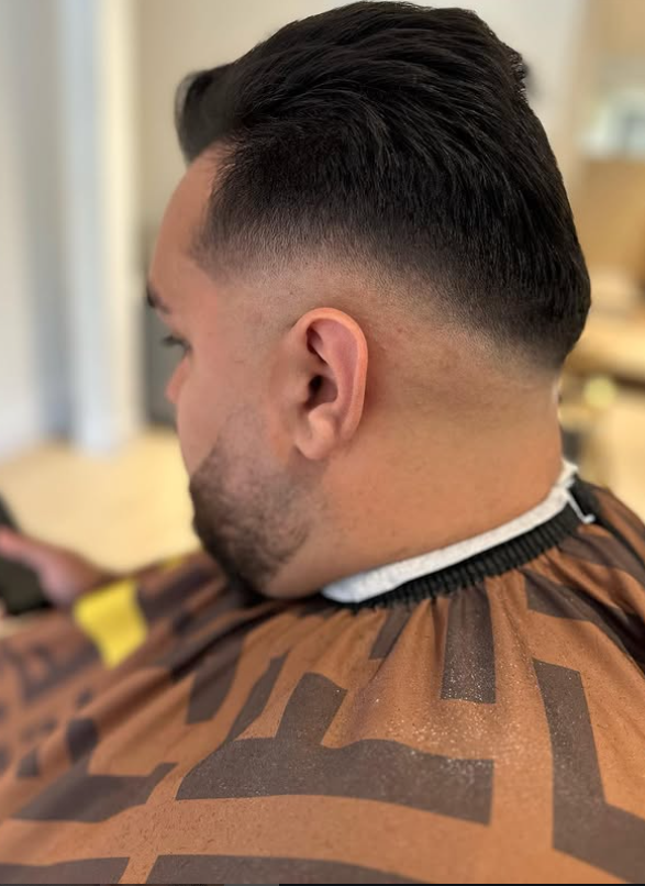 Barber giving a fade haircut in Coquitlam